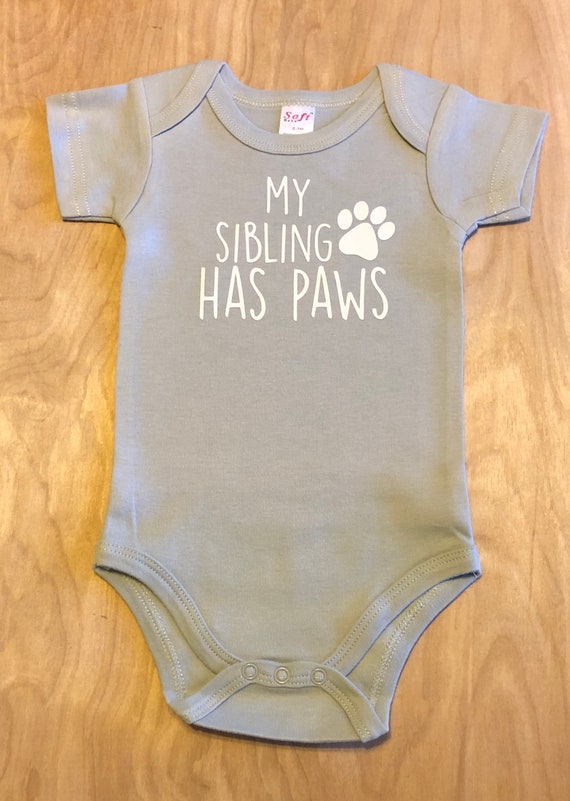 my sibling has paws onesie