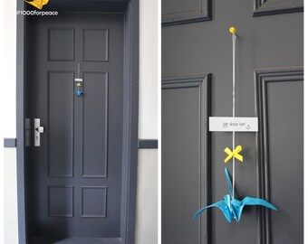 #1000forpeace door ornament