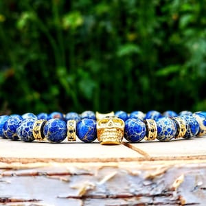 Golden beaded skull bracelet for men and women, Gift for him and her, Blue ocean beads, Stretch bracelet, Jewelry for men