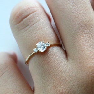Petite Oval Cut Diamond Simulant Three Stone Ring in 10K Gold Engagement Ring, Promise Ring, Dainty Gold Ring, Moissanite Ring image 6