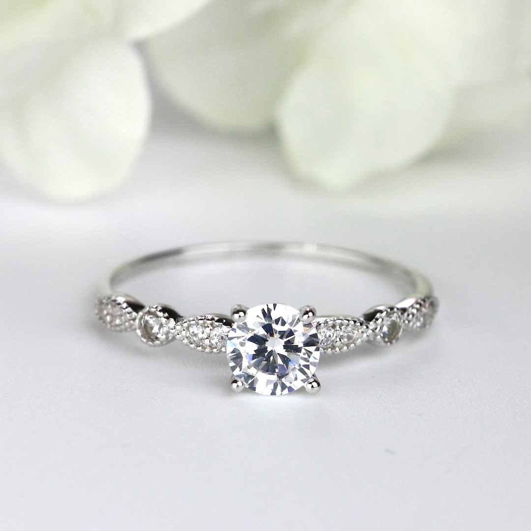 Round Cut Sterling Silver Engagement Ring With Milgrain Detailing