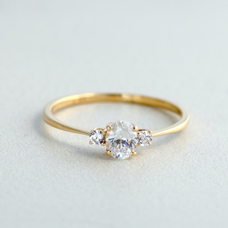 Petite Oval Cut Diamond Simulant Three Stone Ring in 10K Gold Engagement Ring, Promise Ring, Dainty Gold Ring, Moissanite Ring image 1