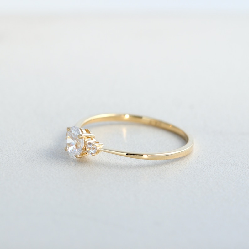 Petite Oval Cut Diamond Simulant Three Stone Ring in 10K Gold Engagement Ring, Promise Ring, Dainty Gold Ring, Moissanite Ring image 2