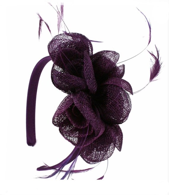 plum coloured hats and fascinators