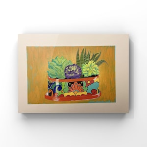 May include: A colorful painting of a rectangular planter filled with succulents. The planter is decorated with a vibrant floral pattern in red, blue, and yellow. The background is a warm, golden-orange hue.