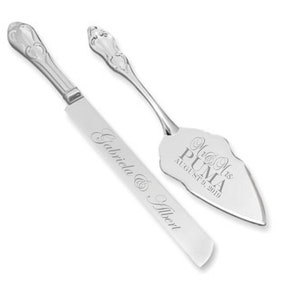 May include: Silver cake knife and server set with engraved names "Gabriela & Albert" and "Mr & Mrs PUMA August 9, 2019".