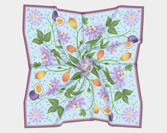 May include: A blue and purple floral patterned silk scarf with a white background and a border of maroon. The scarf features passion fruit flowers and fruit.