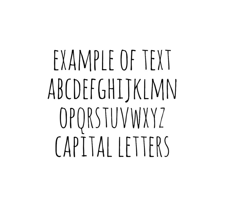 May include: A handwritten alphabet in black ink on a white background. The letters are uppercase and include the phrase "EXAMPLE OF TEXT CAPITAL LETTERS".