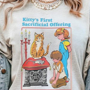 Funny Cat Graphic Tee: Kitty&#39;s Sacrificial Offering - Quirky Cat Lover Shirt