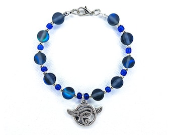 Deep Blue Aura beads with Eye of Horus/Ra with Falcon wings Charm Bracelet  | “Alexandra” Bracelet