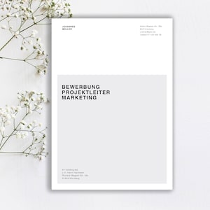 May include: A white and grey document with the text "BEWERBUNG PROJEKTLEITER MARKETING" in black. The document also includes contact information for Johannes Muller and XY Holding AG.