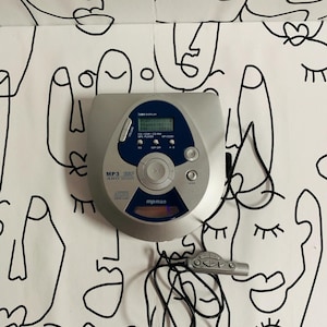 Reproductor de CD MP3 portátil vintage MPMan de los años 90