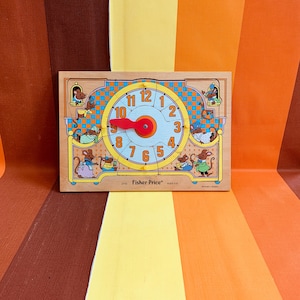 Fisher price teaching clock - Etsy 日本