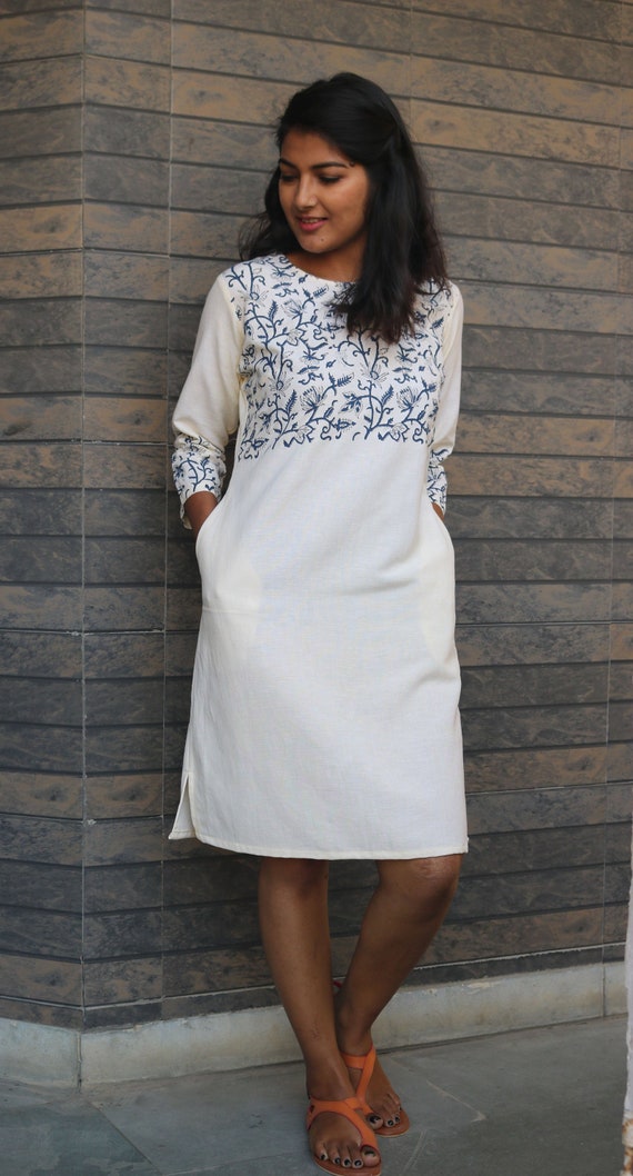 white linen tunic dress