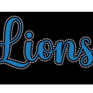 May include: Blue rhinestone design of the word "Lions" on a black background.