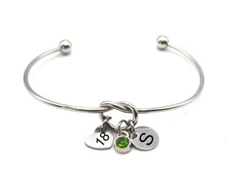Personalised 18th Birthday Knot Bracelet: Initial Disc, Number Eighteen Disc and Birthstone Charm