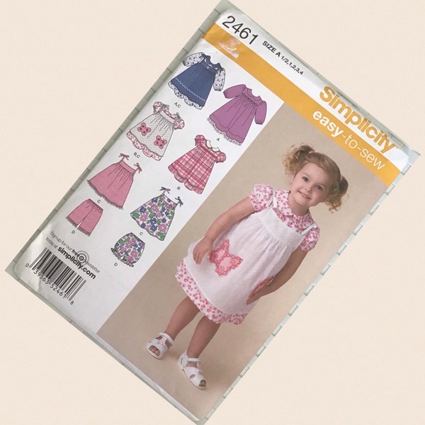 Simplicity Sewing Pattern, no 2561 size A, 1/2,1,2,3,4.. small child’s dress, knickerbockers, pinafore.