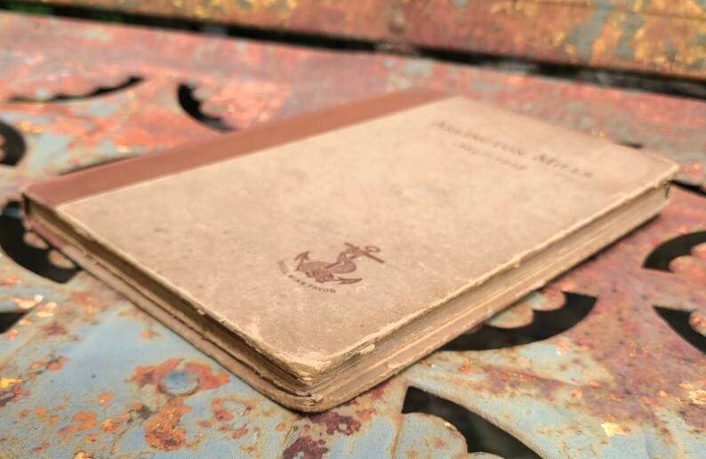 May include: A vintage book titled "Southern Miles" with a brown cover and an anchor symbol on the front.