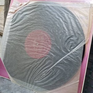 May include: A black vinyl record in a pink and white paper sleeve. The record has a red label with the text "High Fidelity" and "EMI" on it.