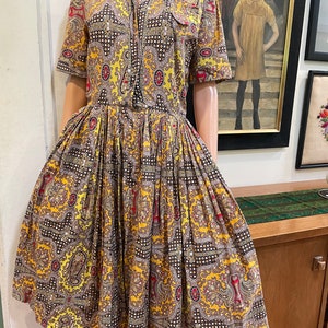 Vintage 50s 60s Mid Century Paisley and Floral Print Pleated Cotton Mod Dress with Rhinestone Buttons