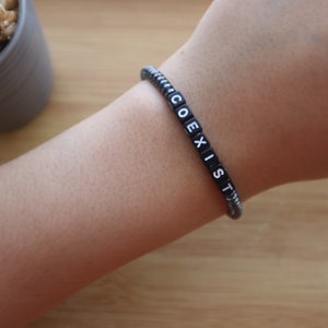 COEXIST Hematit armband