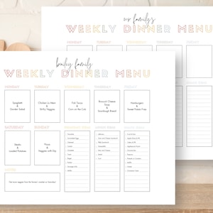 May include: Two white weekly dinner menu planners with colorful text. One is labeled "Bailey Family" and the other "Our Family's." Each planner has sections for daily meals, breakfast, lunch, and snack ideas. The "Bailey Family" planner includes meal ideas.
