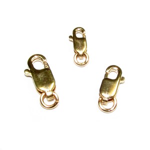 May include: Three gold-toned lobster clasps of different sizes. The clasps are used for jewelry making.