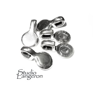 May include: Silver-toned metal pendant bails with a round shape and a loop at the top. The bails are designed for attaching charms or pendants to jewelry.