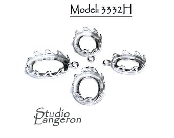 May include: Four silver oval-shaped pendant settings with a decorative edge. The settings are for jewelry making and have a hole at the top for attaching a bail.