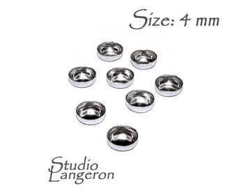 May include: Eight silver-coloured metal cup-shaped embellishments, each measuring 4 mm in diameter. Size: 4 mm