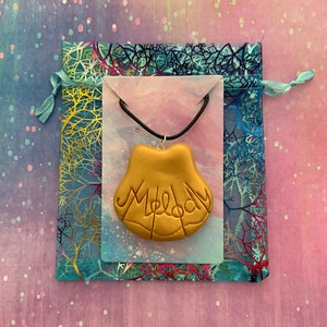 Melody necklace shop the little mermaid