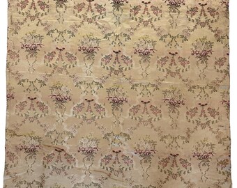 May include: A vintage fabric with a repeating pattern of floral bouquets in shades of pink, yellow, and green on a cream background.