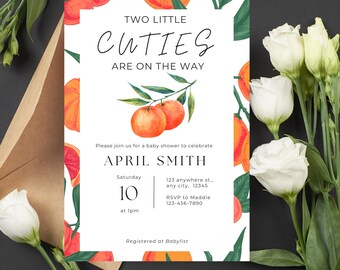 Puede incluir: Una invitación para un baby shower con el texto "TWO LITTLE CUTIES ARE ON THE WAY". La invitación presenta naranjas en acuarela y hojas verdes. Detalles: nombre April Smith, fecha, hora e información de RSVP.