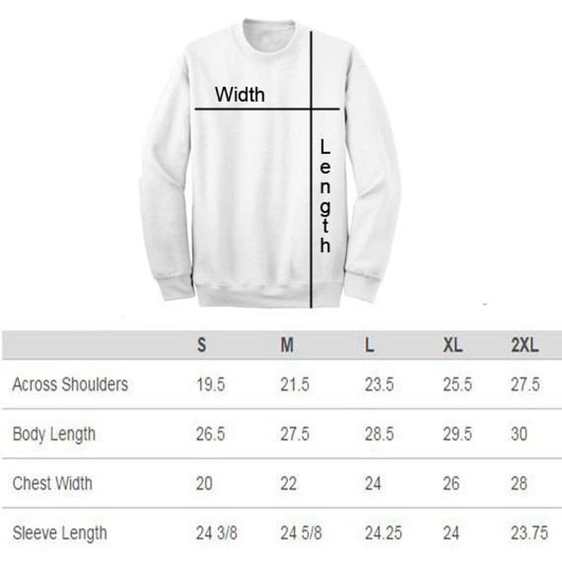 May include: Size chart for a sweatshirt with measurements in inches for across shoulders, body length, chest width, and sleeve length. Sizes include S, M, L, XL, and 2XL.