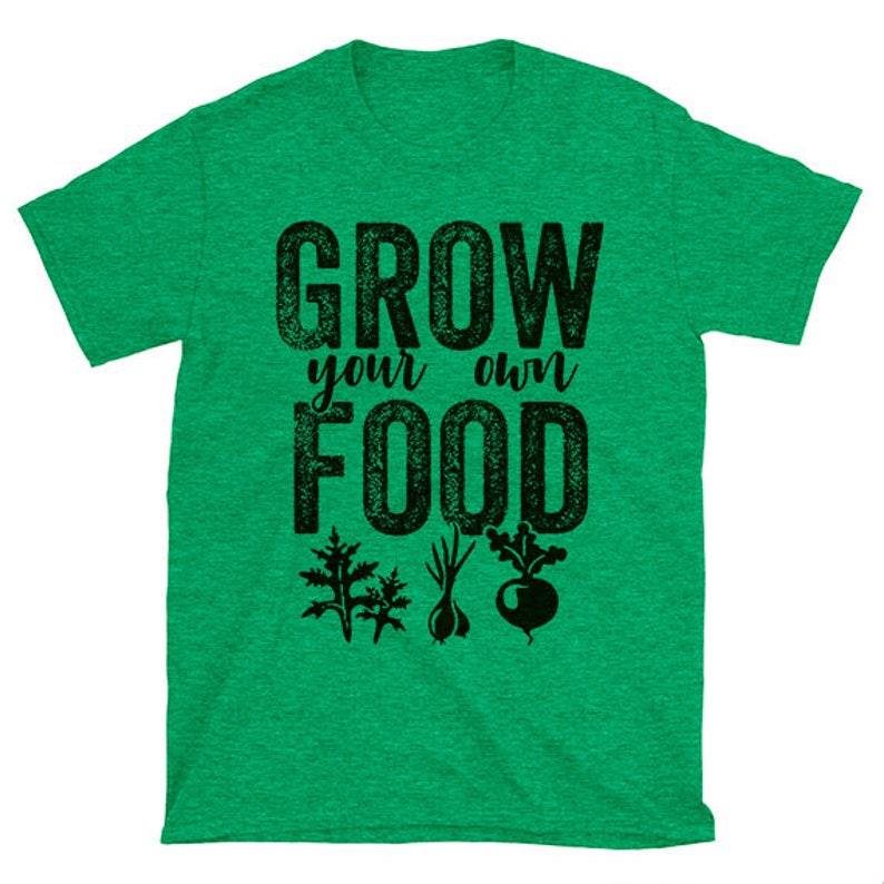 May include: Green t-shirt with the text "GROW your own FOOD" in black with a distressed look.  The shirt has a graphic of three different vegetables.