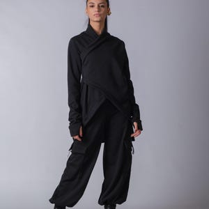 Durable heavy cotton joggers for women featuring spacious pockets and trendy baggy style

Black women’s streetwear cargo pants with soft loungewear feel and wide comfortable fit