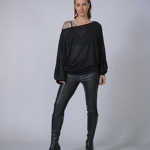 Women’s loose off-shoulder tunic, ethical minimalist fashion.