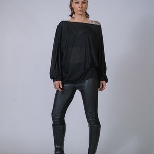 Avant-garde draped long sleeve top, handmade designer style.