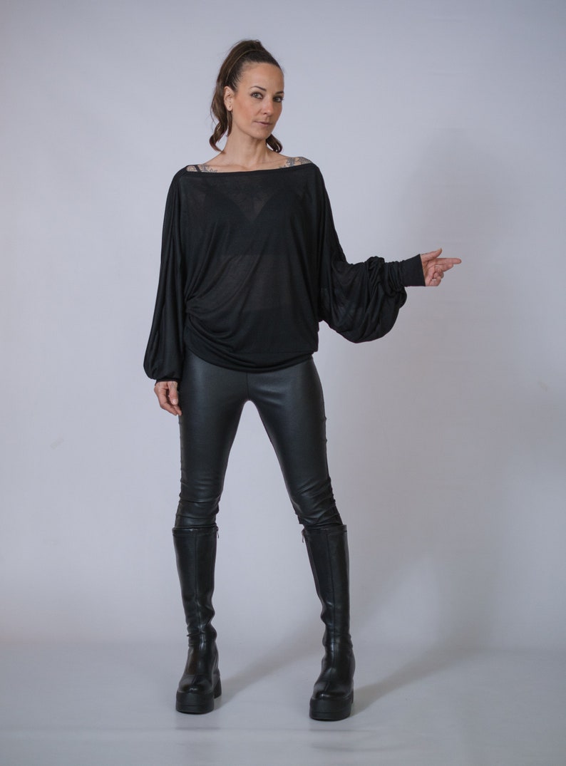 Soft oversized blouse, casual streetwear with batwing sleeves.