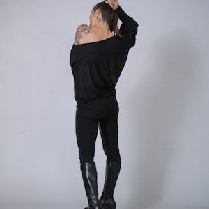 Post-apocalyptic inspired oversized blouse, edgy streetwear design.