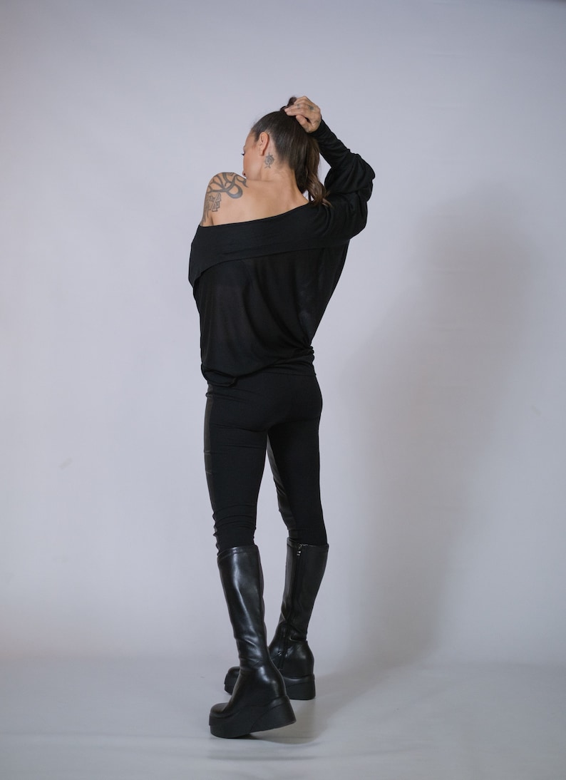 Post-apocalyptic inspired oversized blouse, edgy streetwear design.