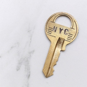 NYC - New York City key - hand stamped key necklace or keychain - A gift for you or your awesome friend!
