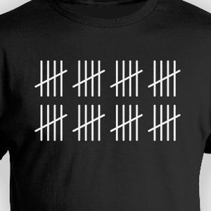 May include: Black t-shirt with a white graphic of tally marks. The graphic shows 30 tally marks arranged in rows of five.