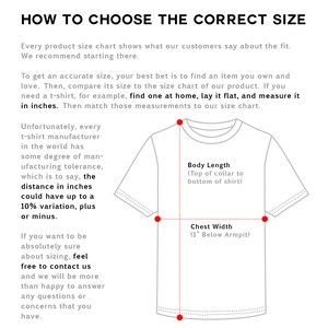 May include: Diagram showing how to measure a t-shirt for size. The diagram shows a white t-shirt with red lines indicating where to measure the body length from the top of the collar to the bottom of the shirt and the chest width 1 inch below the armpit.