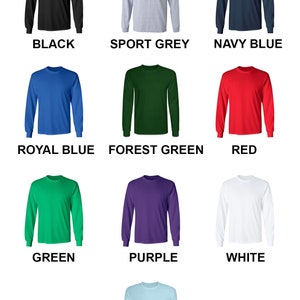 May include: Color chart showing different long-sleeve t-shirt colors. The colors are: black, sport grey, navy blue, royal blue, forest green, red, green, purple, white, and light blue.