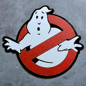 Ghostbusters Sign Logo available with No Fixture, with 3M double sided Tape or as a Magnet. Size 76mm x 60mm.