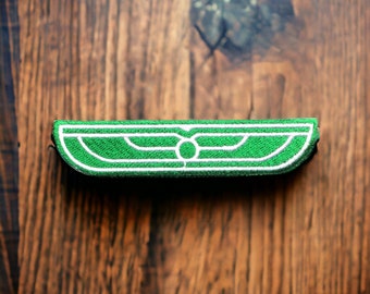 Naszywka do prasowania z haftem "Alien USCSS Nostromo Weyland Yutani Green Wings" (95 mm x 20 mm)