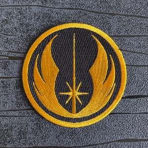 Jedi Order Embroidered Iron on Patch (75mm) in Gold and Black