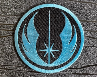 Écusson brodé à repasser Ordre Jedi (75 mm) en bleu et noir