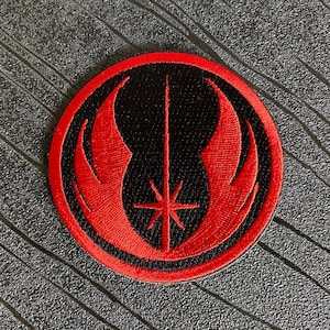 May include: Red and black embroidered patch with the Star Wars Rebel Alliance symbol.